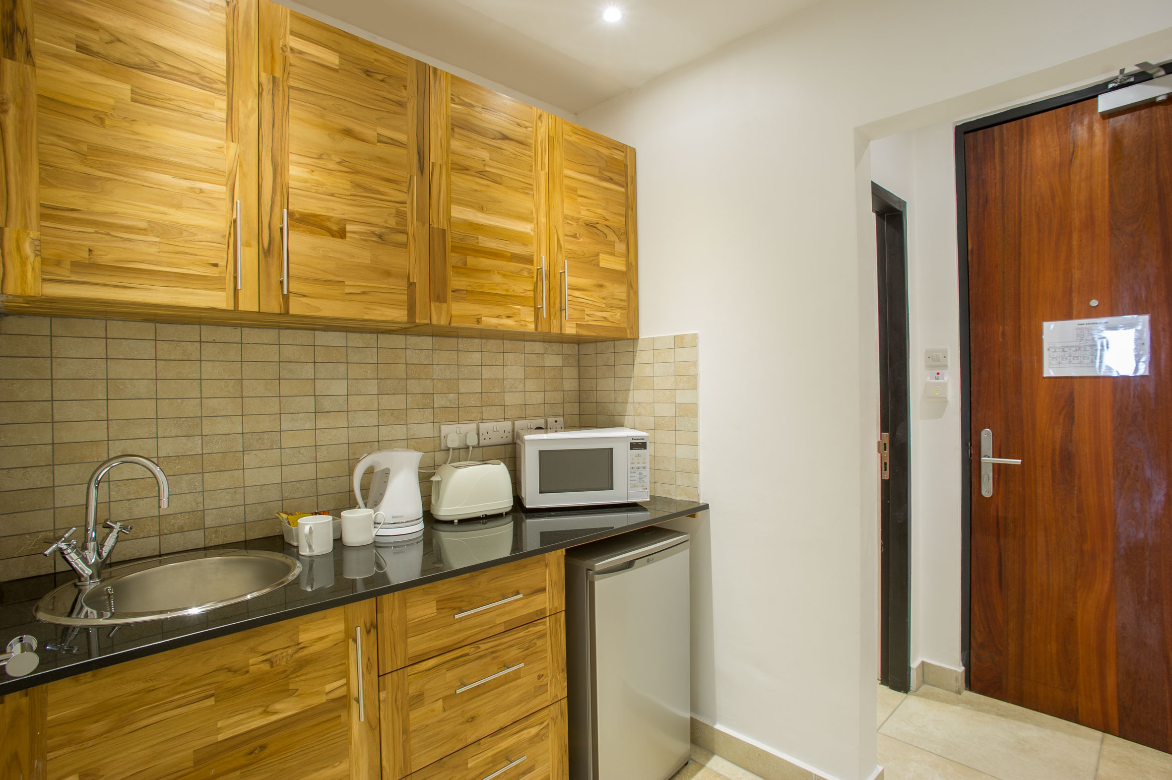 kitchen at The Oyster bay Hotel Suites 